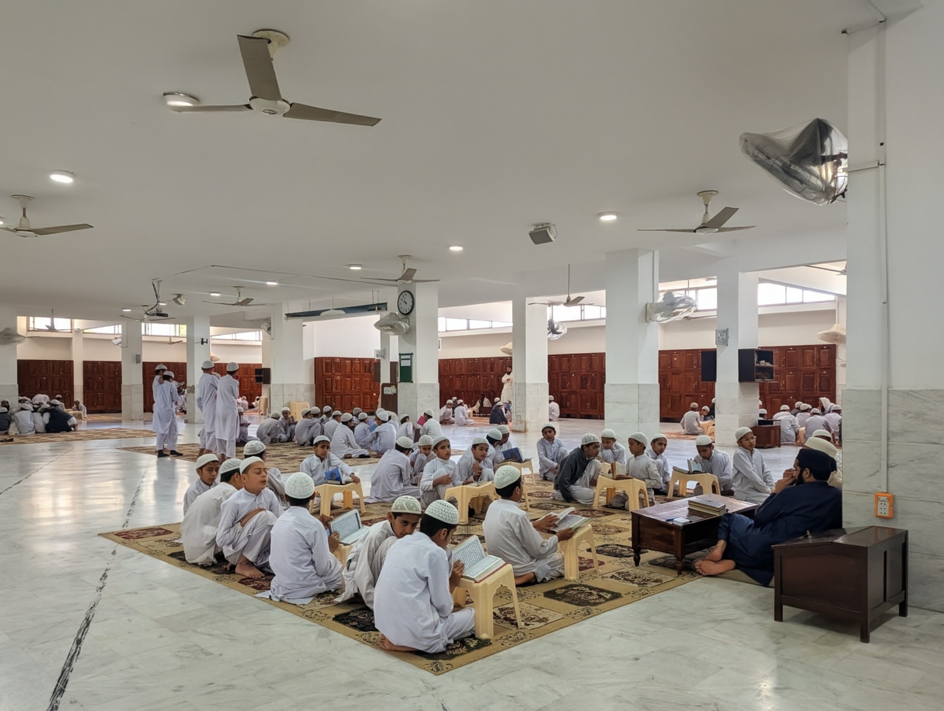 Students learning Quran recitation